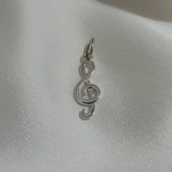Dije "Clave de Sol" chica
