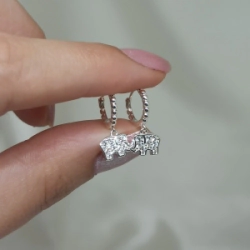 Aros cierre huggies + dije - Modelo N�  29