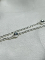 Pulsera doble + dos bolitas
